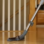 Vacuuming a hardwood floor