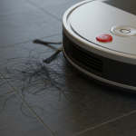 vacuum cleaner cleaing hairs from the floor